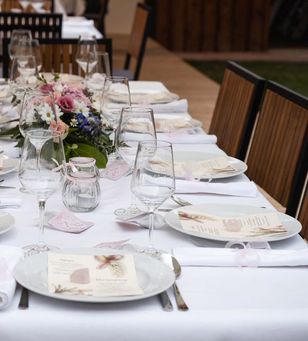 Laid wedding tables prepared for the bridal couple and guests at Quartier 35 